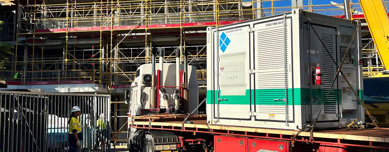 energy storage system on the back of truck being transported to construction site