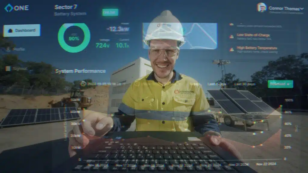 construction site worker accessing one telemetry dashboard with fuel saving metrics showing